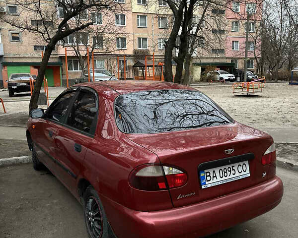 Красный Дэу Ланос, объемом двигателя 1.39 л и пробегом 60 тыс. км за 2700 $, фото 1 на Automoto.ua