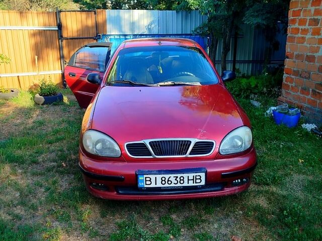 Красный Дэу Ланос, объемом двигателя 1.4 л и пробегом 250 тыс. км за 2500 $, фото 1 на Automoto.ua