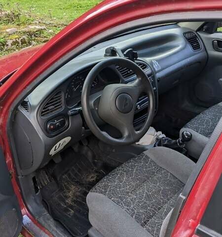 Красный Дэу Ланос, объемом двигателя 1.5 л и пробегом 180 тыс. км за 2000 $, фото 1 на Automoto.ua