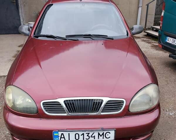 Красный Дэу Ланос, объемом двигателя 1.5 л и пробегом 330 тыс. км за 1400 $, фото 1 на Automoto.ua