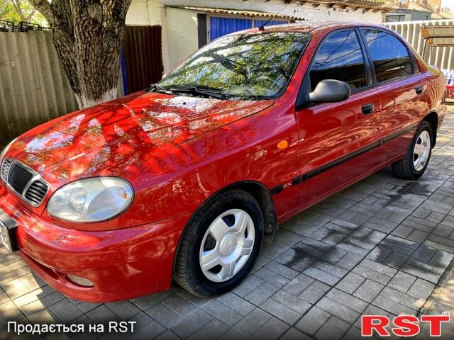 Красный Дэу Ланос, объемом двигателя 1.6 л и пробегом 155 тыс. км за 4000 $, фото 1 на Automoto.ua