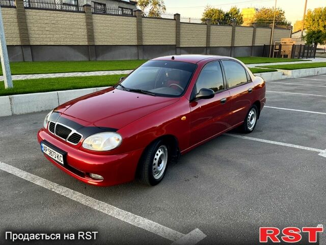 Красный Дэу Ланос, объемом двигателя 1.4 л и пробегом 150 тыс. км за 2700 $, фото 1 на Automoto.ua