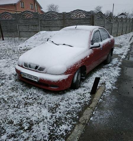 Красный Дэу Ланос, объемом двигателя 1.4 л и пробегом 130 тыс. км за 2500 $, фото 1 на Automoto.ua