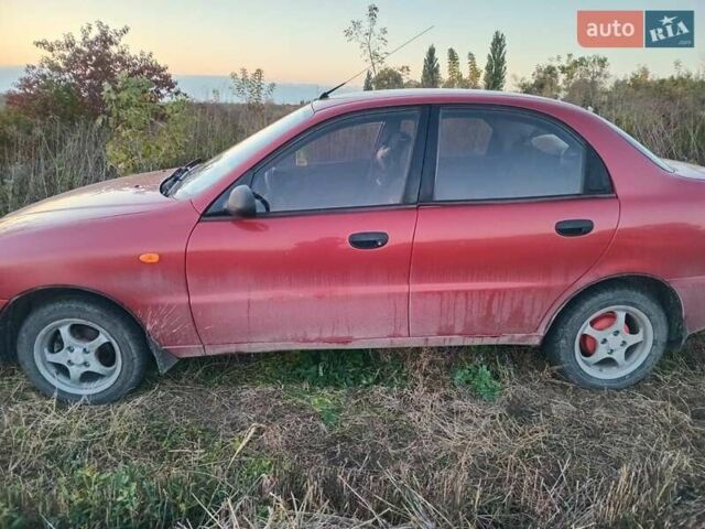 Красный Дэу Ланос, объемом двигателя 1.5 л и пробегом 160 тыс. км за 1650 $, фото 1 на Automoto.ua