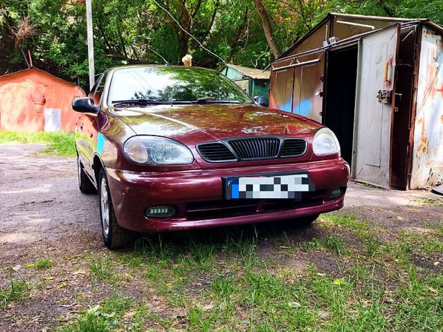 Красный Дэу Ланос, объемом двигателя 1.5 л и пробегом 213 тыс. км за 3000 $, фото 1 на Automoto.ua