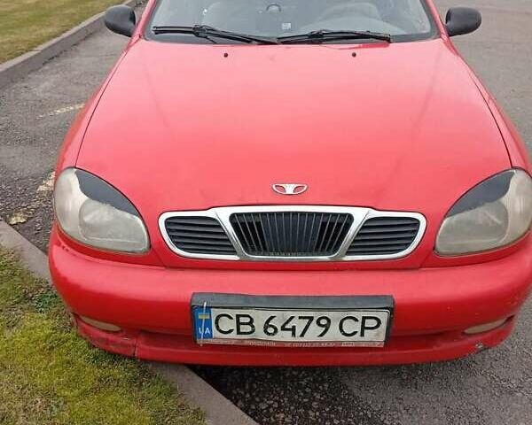 Красный Дэу Ланос, объемом двигателя 1.5 л и пробегом 180 тыс. км за 700 $, фото 1 на Automoto.ua