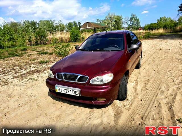 Красный Дэу Ланос, объемом двигателя 1.6 л и пробегом 160 тыс. км за 1550 $, фото 1 на Automoto.ua
