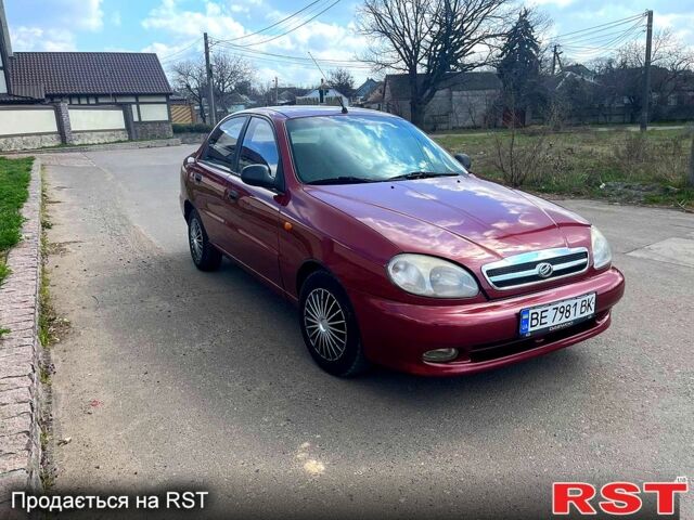 Красный Дэу Ланос, объемом двигателя 1.5 л и пробегом 220 тыс. км за 2200 $, фото 1 на Automoto.ua