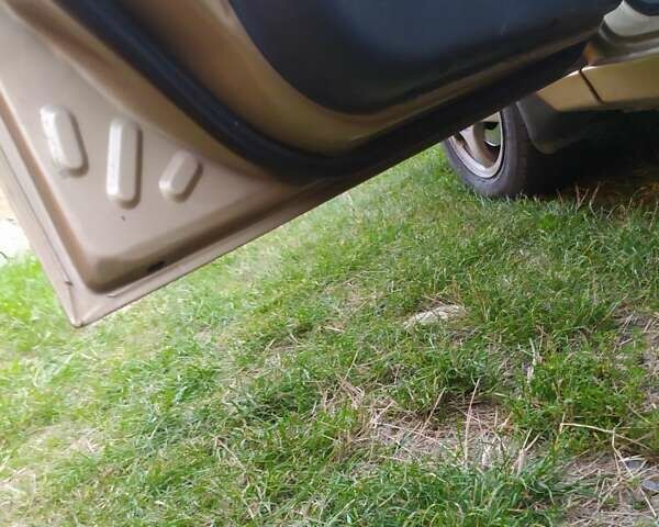 Желтый Дэу Ланос, объемом двигателя 1.6 л и пробегом 265 тыс. км за 2850 $, фото 1 на Automoto.ua