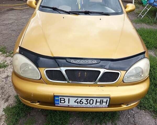 Желтый Дэу Ланос, объемом двигателя 1.3 л и пробегом 245 тыс. км за 2550 $, фото 1 на Automoto.ua