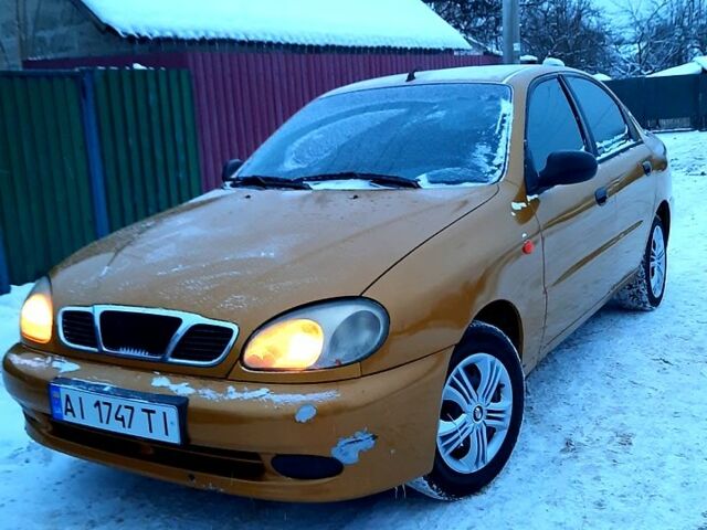 Желтый Дэу Ланос, объемом двигателя 1.5 л и пробегом 200 тыс. км за 2100 $, фото 1 на Automoto.ua