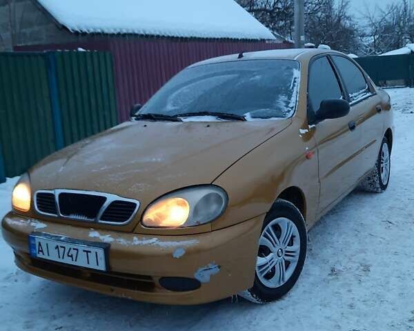 Желтый Дэу Ланос, объемом двигателя 1.5 л и пробегом 200 тыс. км за 2100 $, фото 1 на Automoto.ua