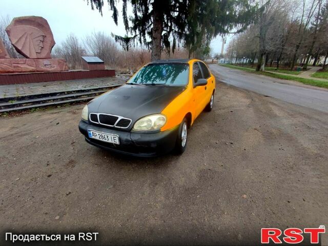 Желтый Дэу Ланос, объемом двигателя 1.4 л и пробегом 269 тыс. км за 1250 $, фото 1 на Automoto.ua