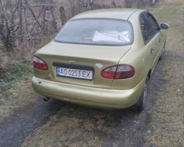 Жовтий Деу Ланос, об'ємом двигуна 1.5 л та пробігом 350 тис. км за 2000 $, фото 1 на Automoto.ua
