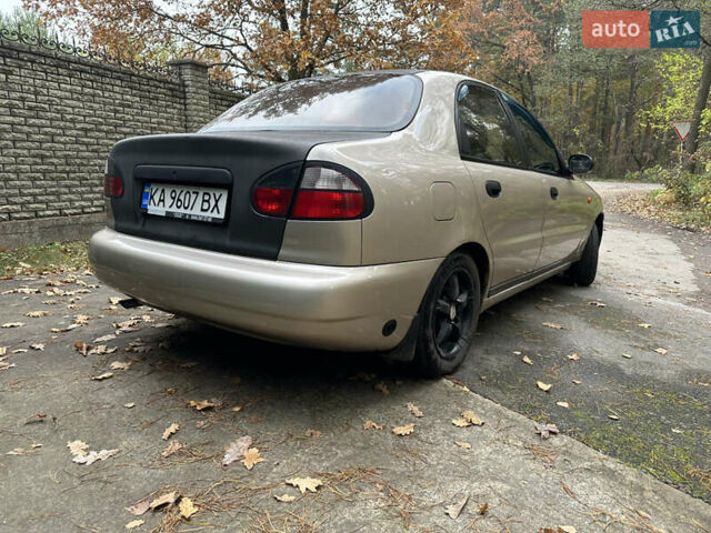 Желтый Дэу Ланос, объемом двигателя 1.5 л и пробегом 222 тыс. км за 1499 $, фото 1 на Automoto.ua