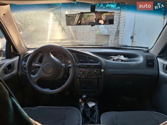Сірий Деу Ланос, об'ємом двигуна 1.5 л та пробігом 312 тис. км за 800 $, фото 1 на Automoto.ua