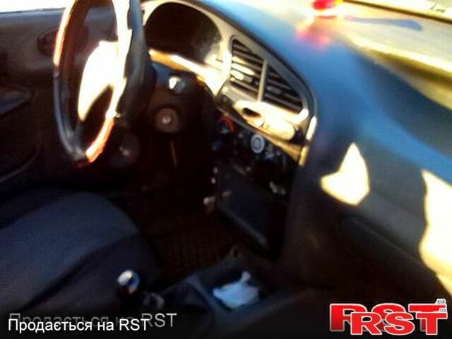 Серый Дэу Ланос, объемом двигателя 1.5 л и пробегом 272 тыс. км за 1500 $, фото 1 на Automoto.ua