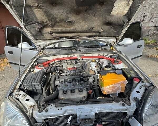 Серый Дэу Ланос, объемом двигателя 1.5 л и пробегом 400 тыс. км за 1800 $, фото 1 на Automoto.ua