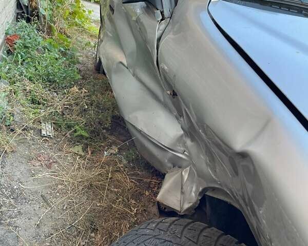 Серый Дэу Ланос, объемом двигателя 1.5 л и пробегом 251 тыс. км за 889 $, фото 1 на Automoto.ua