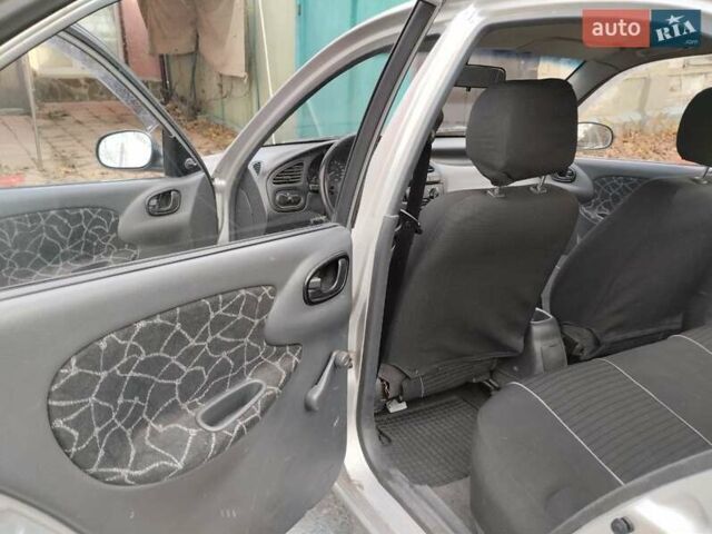 Сірий Деу Ланос, об'ємом двигуна 1.35 л та пробігом 117 тис. км за 1400 $, фото 1 на Automoto.ua