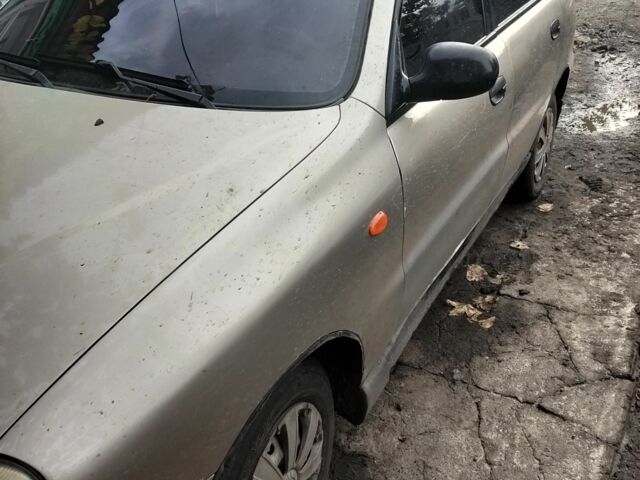 Деу Ланос 2002 у Кам'янське (Дніпродзержинськ) на Automoto.ua Сірий Деу Ланос, об'ємом двигуна 1.5 л та пробігом 131 тис. км за 1100 $, фото 1 на Automoto.ua