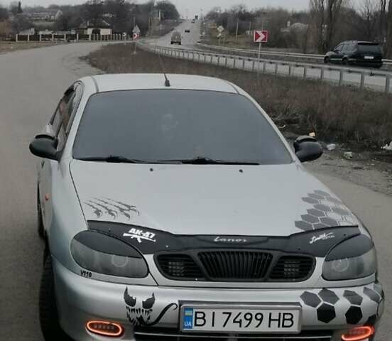 Серый Дэу Ланос, объемом двигателя 1.5 л и пробегом 210 тыс. км за 2800 $, фото 1 на Automoto.ua