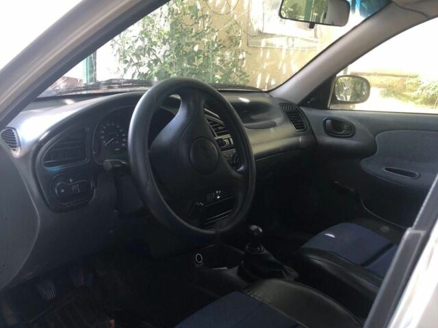 Серый Дэу Ланос, объемом двигателя 1 л и пробегом 40 тыс. км за 1948 $, фото 1 на Automoto.ua