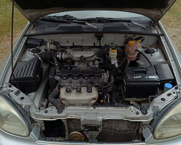 Серый Дэу Ланос, объемом двигателя 1.5 л и пробегом 225 тыс. км за 2500 $, фото 1 на Automoto.ua