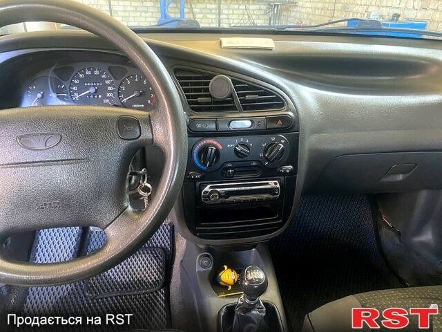 Серый Дэу Ланос, объемом двигателя 1.6 л и пробегом 260 тыс. км за 2650 $, фото 1 на Automoto.ua