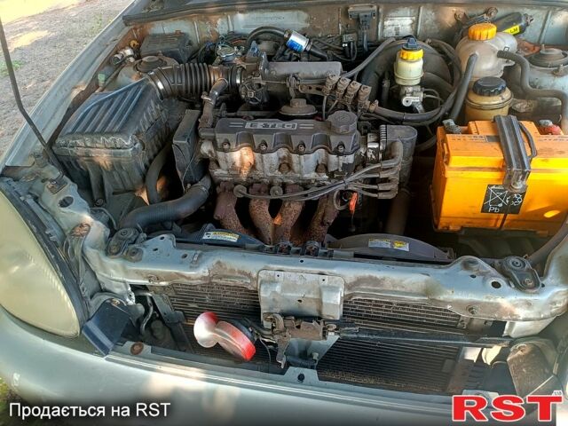 Серый Дэу Ланос, объемом двигателя 1.5 л и пробегом 200 тыс. км за 1150 $, фото 1 на Automoto.ua