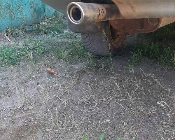 Серый Дэу Ланос, объемом двигателя 1.5 л и пробегом 250 тыс. км за 2750 $, фото 1 на Automoto.ua