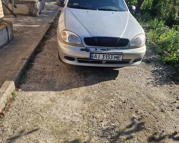 Сірий Деу Ланос, об'ємом двигуна 1.5 л та пробігом 313 тис. км за 1000 $, фото 1 на Automoto.ua