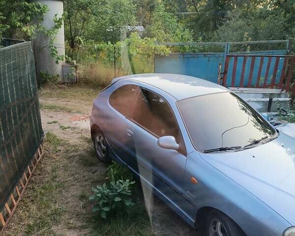 Синий Дэу Ланос, объемом двигателя 1.6 л и пробегом 228 тыс. км за 1700 $, фото 1 на Automoto.ua