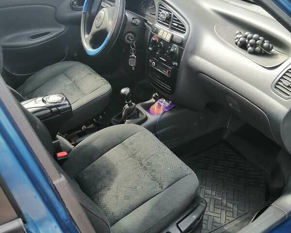 Синий Дэу Ланос, объемом двигателя 1.5 л и пробегом 380 тыс. км за 1900 $, фото 1 на Automoto.ua