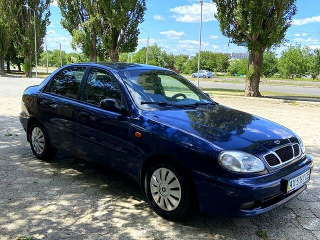 Синий Дэу Ланос, объемом двигателя 1.6 л и пробегом 256 тыс. км за 2300 $, фото 1 на Automoto.ua