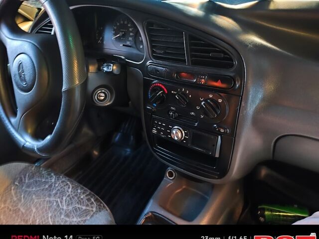 Синій Деу Ланос, об'ємом двигуна 1.5 л та пробігом 228 тис. км за 1650 $, фото 1 на Automoto.ua