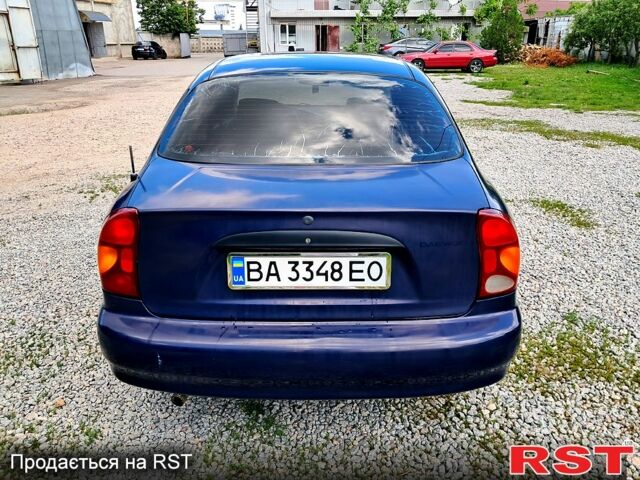 Синій Деу Ланос, об'ємом двигуна 1.5 л та пробігом 234 тис. км за 1900 $, фото 1 на Automoto.ua