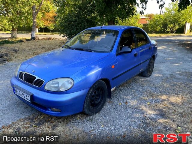 Синий Дэу Ланос, объемом двигателя 1.5 л и пробегом 305 тыс. км за 1950 $, фото 1 на Automoto.ua