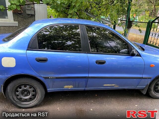 Синий Дэу Ланос, объемом двигателя 1.5 л и пробегом 305 тыс. км за 2100 $, фото 1 на Automoto.ua