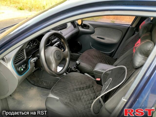 Синий Дэу Ланос, объемом двигателя 1.5 л и пробегом 230 тыс. км за 2500 $, фото 1 на Automoto.ua