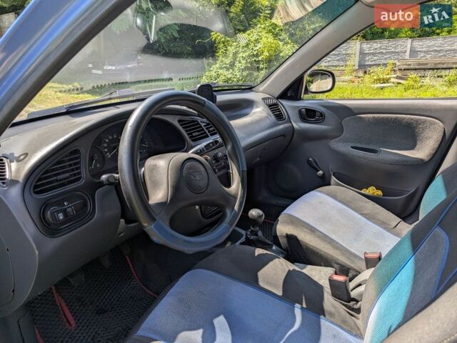 Синий Дэу Ланос, объемом двигателя 1.5 л и пробегом 152 тыс. км за 1900 $, фото 1 на Automoto.ua