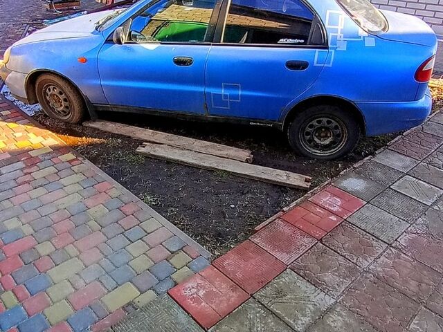Синий Дэу Ланос, объемом двигателя 1.5 л и пробегом 260 тыс. км за 1100 $, фото 1 на Automoto.ua