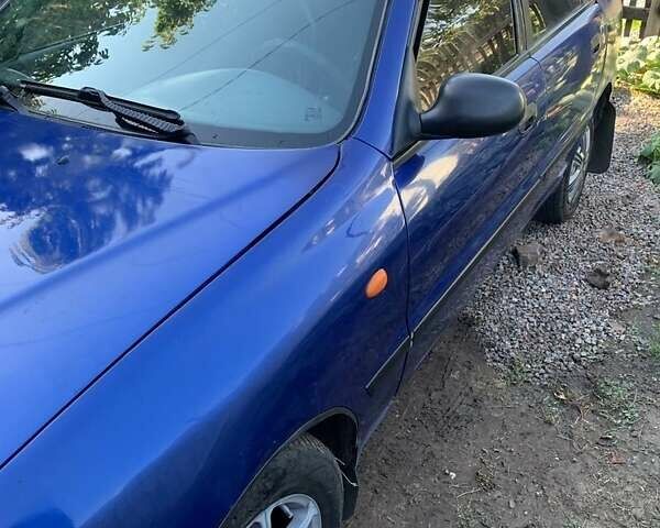 Синий Дэу Ланос, объемом двигателя 1.5 л и пробегом 100 тыс. км за 2000 $, фото 1 на Automoto.ua