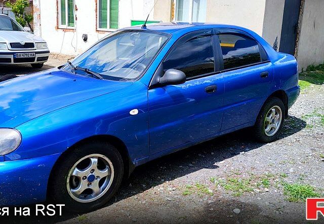 Синий Дэу Ланос, объемом двигателя 1.4 л и пробегом 200 тыс. км за 1800 $, фото 1 на Automoto.ua
