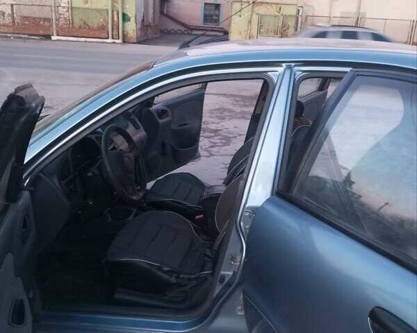 Синий Дэу Ланос, объемом двигателя 1.3 л и пробегом 290 тыс. км за 1400 $, фото 1 на Automoto.ua