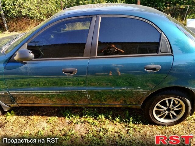 Зеленый Дэу Ланос, объемом двигателя 1.6 л и пробегом 450 тыс. км за 3000 $, фото 1 на Automoto.ua