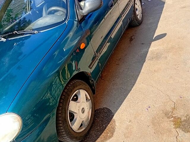 Зеленый Дэу Ланос, объемом двигателя 1.6 л и пробегом 269 тыс. км за 950 $, фото 1 на Automoto.ua