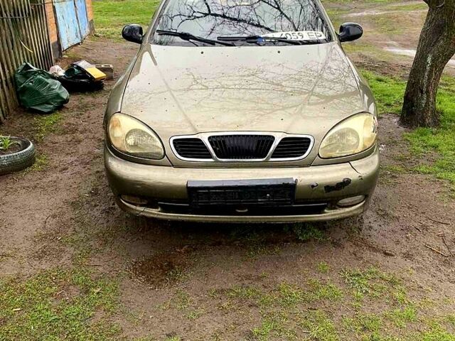 Зеленый Дэу Ланос, объемом двигателя 1.4 л и пробегом 232 тыс. км за 800 $, фото 1 на Automoto.ua