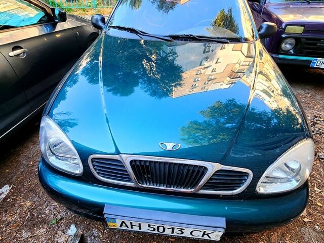 Зеленый Дэу Ланос, объемом двигателя 1.4 л и пробегом 119 тыс. км за 2300 $, фото 1 на Automoto.ua