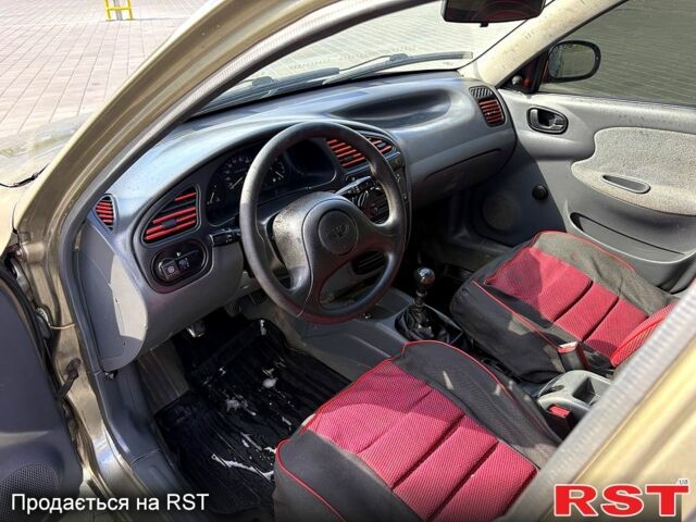 Зеленый Дэу Ланос, объемом двигателя 1.4 л и пробегом 136 тыс. км за 1400 $, фото 1 на Automoto.ua